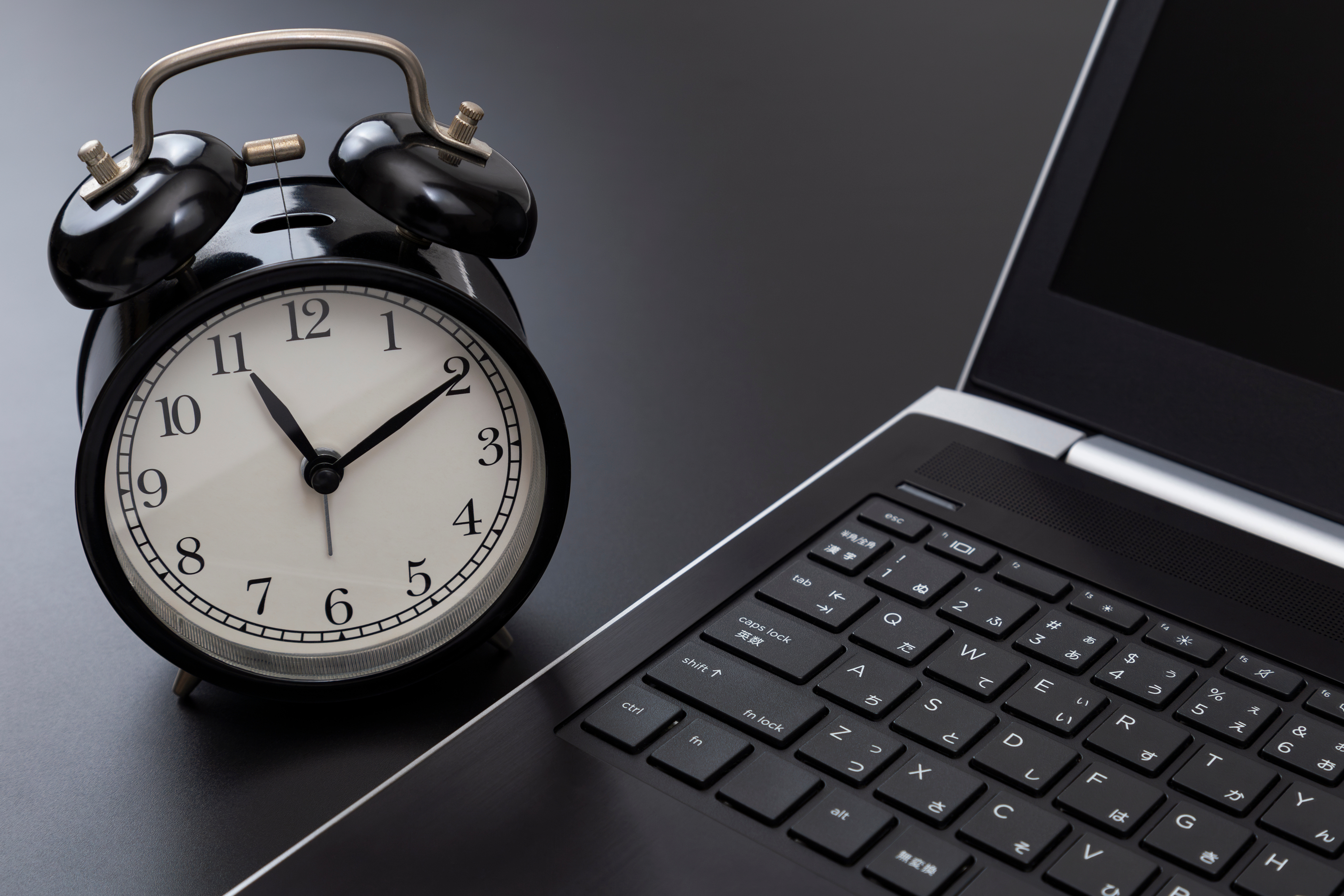 Clock sitting by computer
