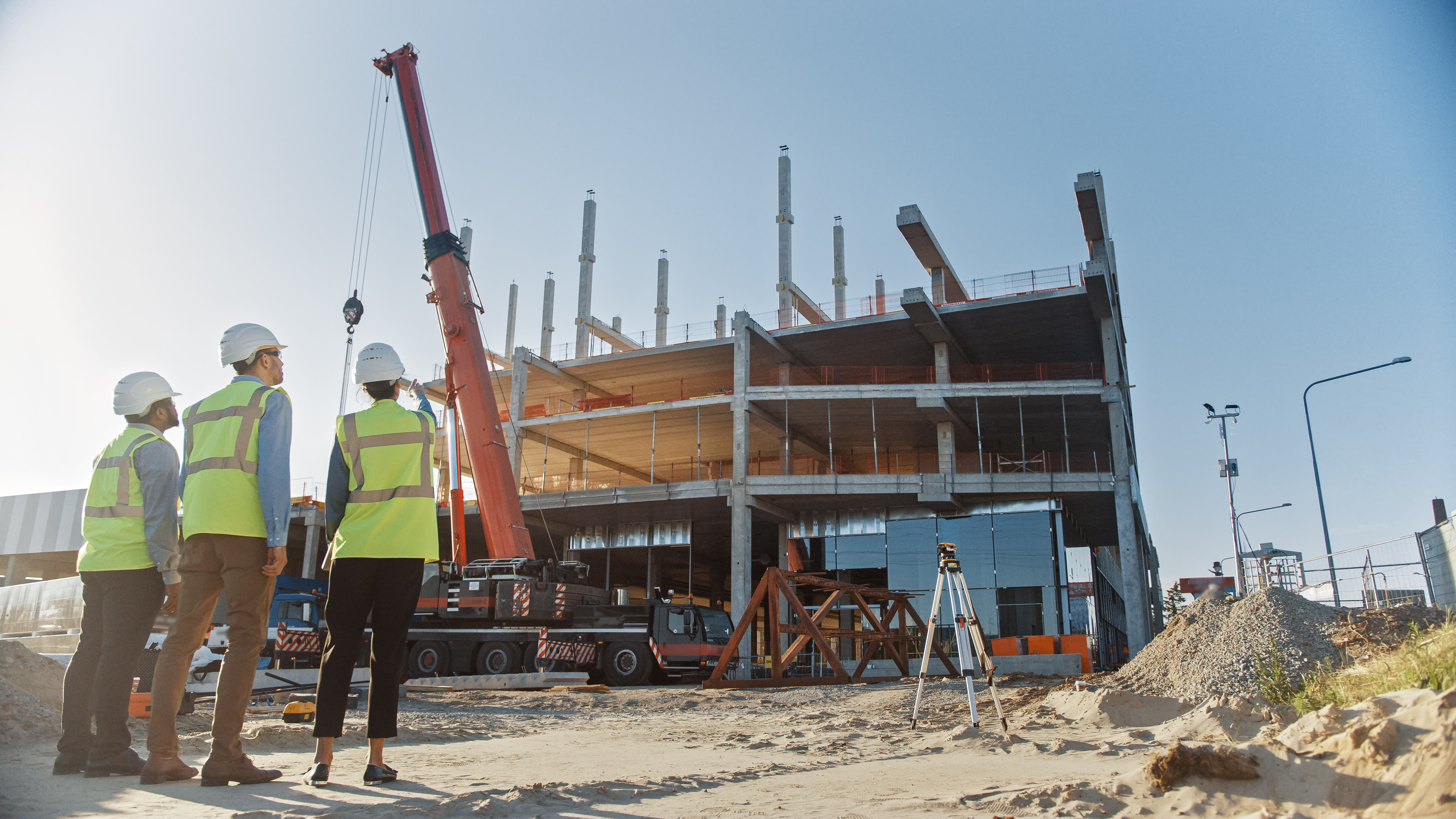 Engineers looking at building under construction
