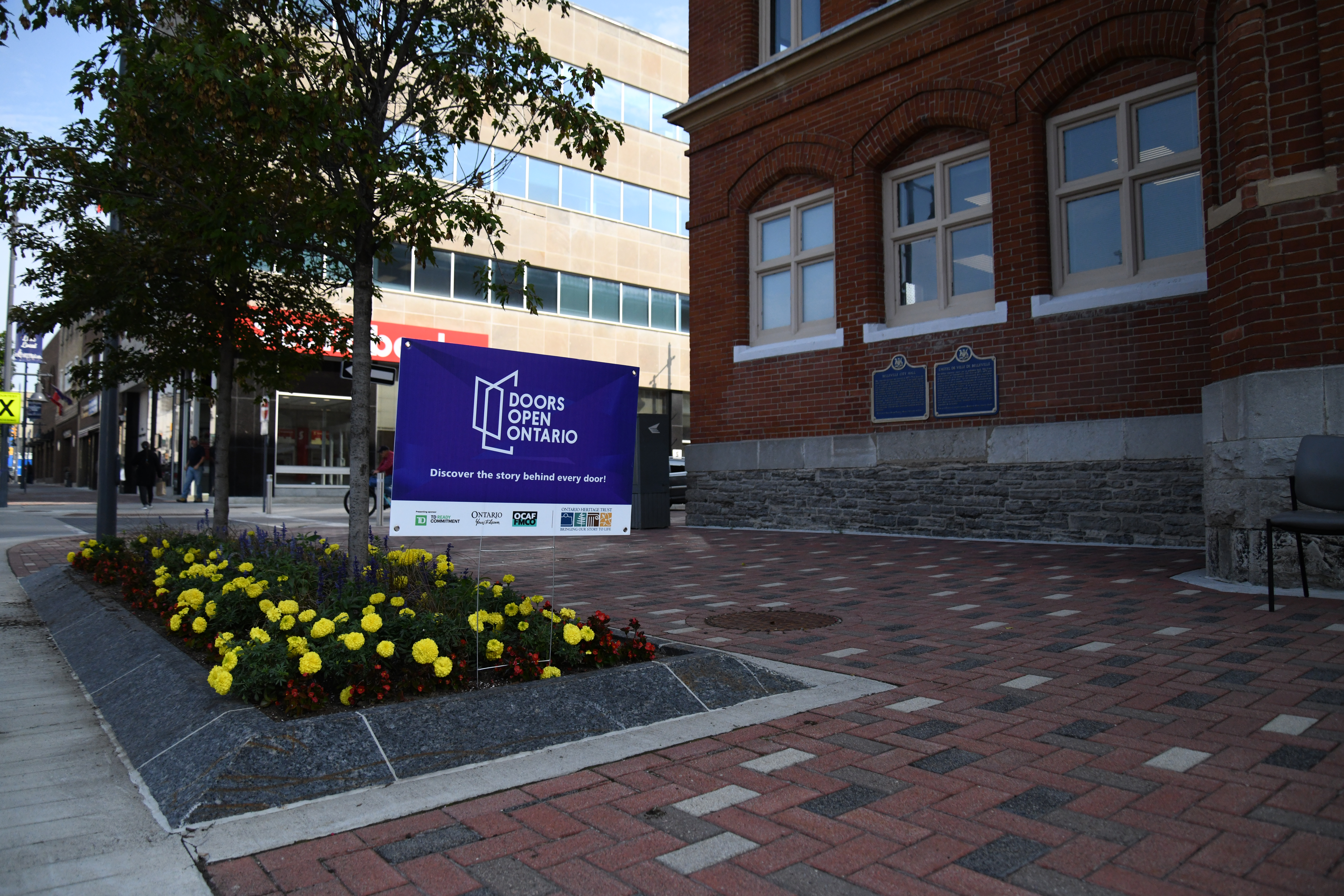 Doors Open sign outside of City Hall