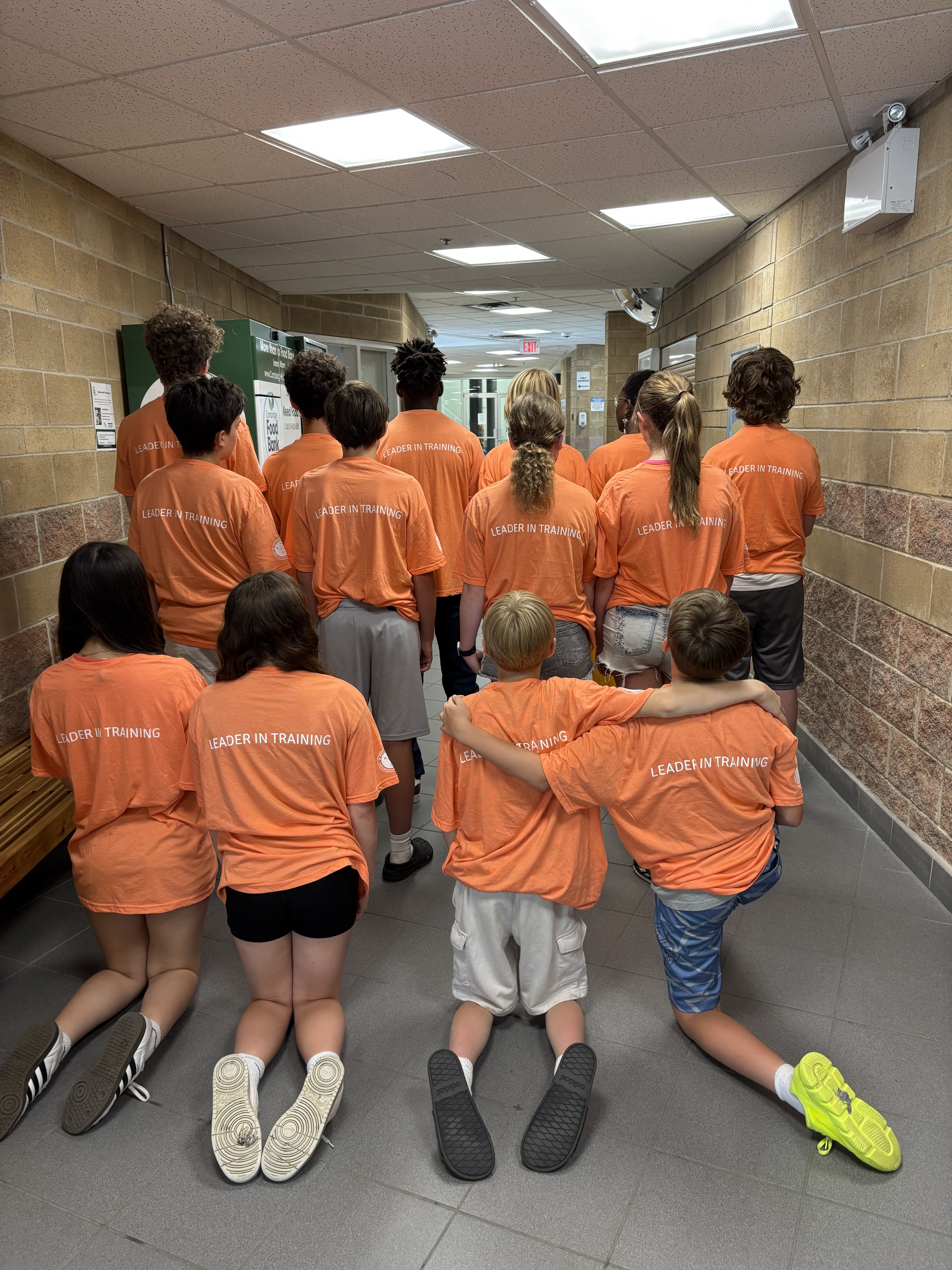 A group of Cambridge youth Leaders in Training graduates pose together after completing the City’s summer camp leadership program.