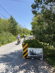 An historic photo of a ferry boat on an apple bin on West Beach Road.