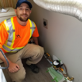 Person installing water meter
