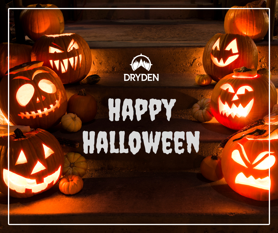 Halloween steps with jack-o-lanterns lit. A banner states Happy Halloween!