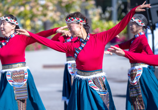 A still image of dance performers.
