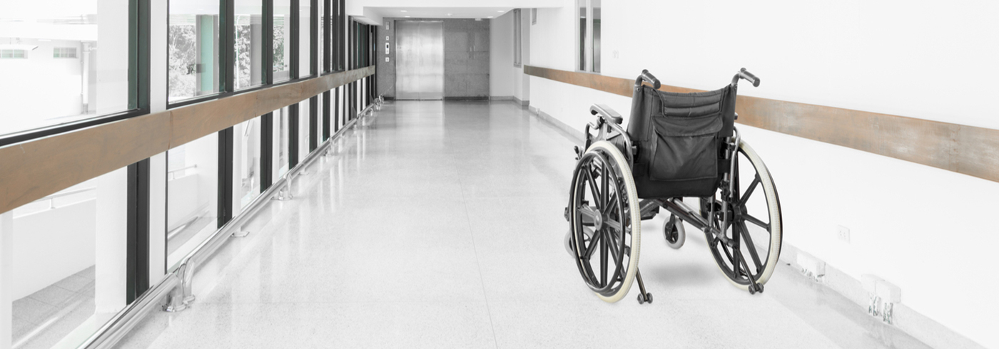 Empty wheelchair in a hallway