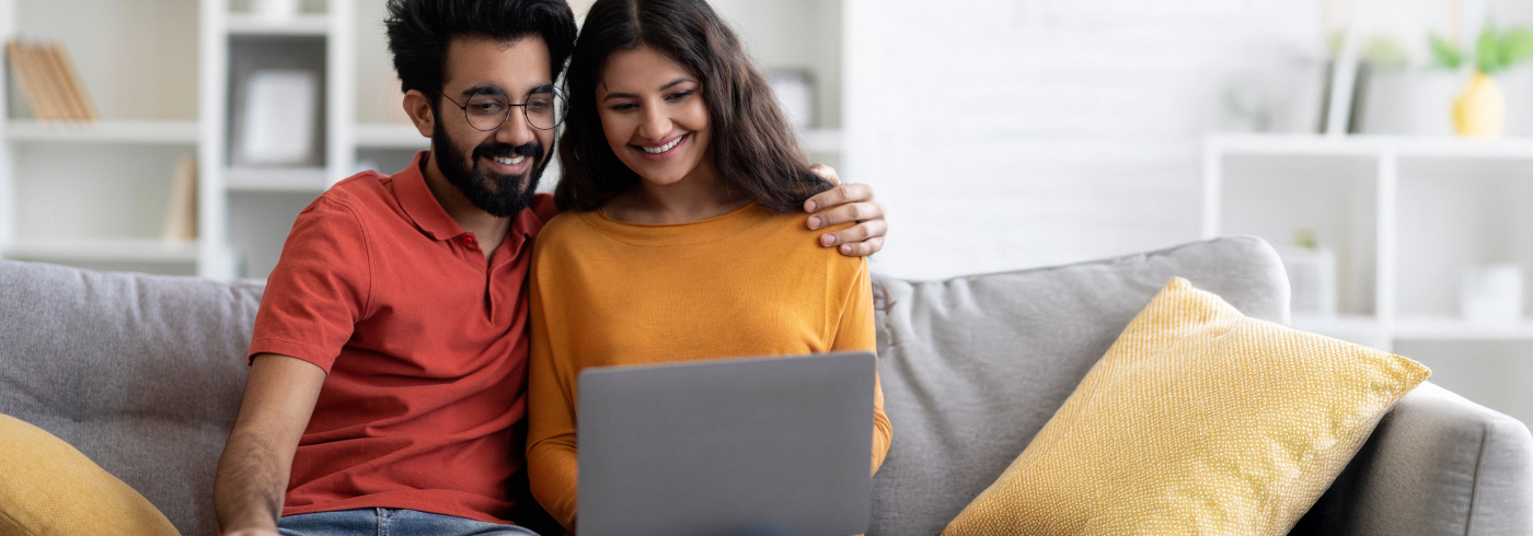 Couple looking at a computer