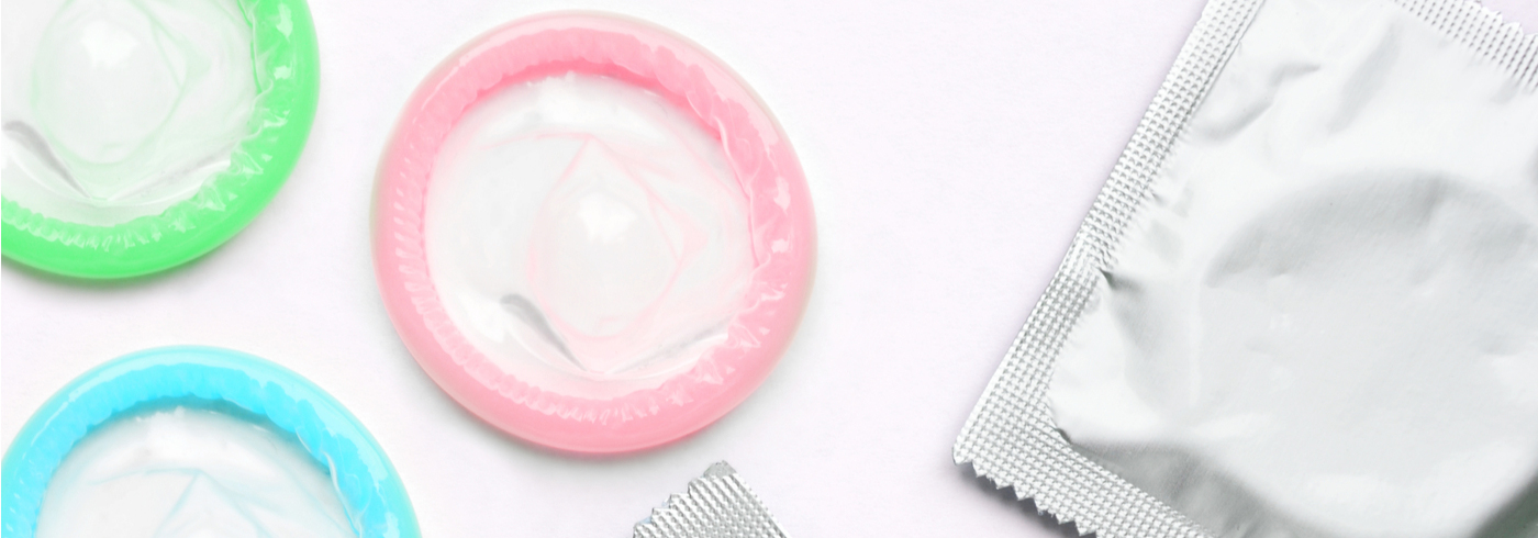 Male condoms in variety colours. 