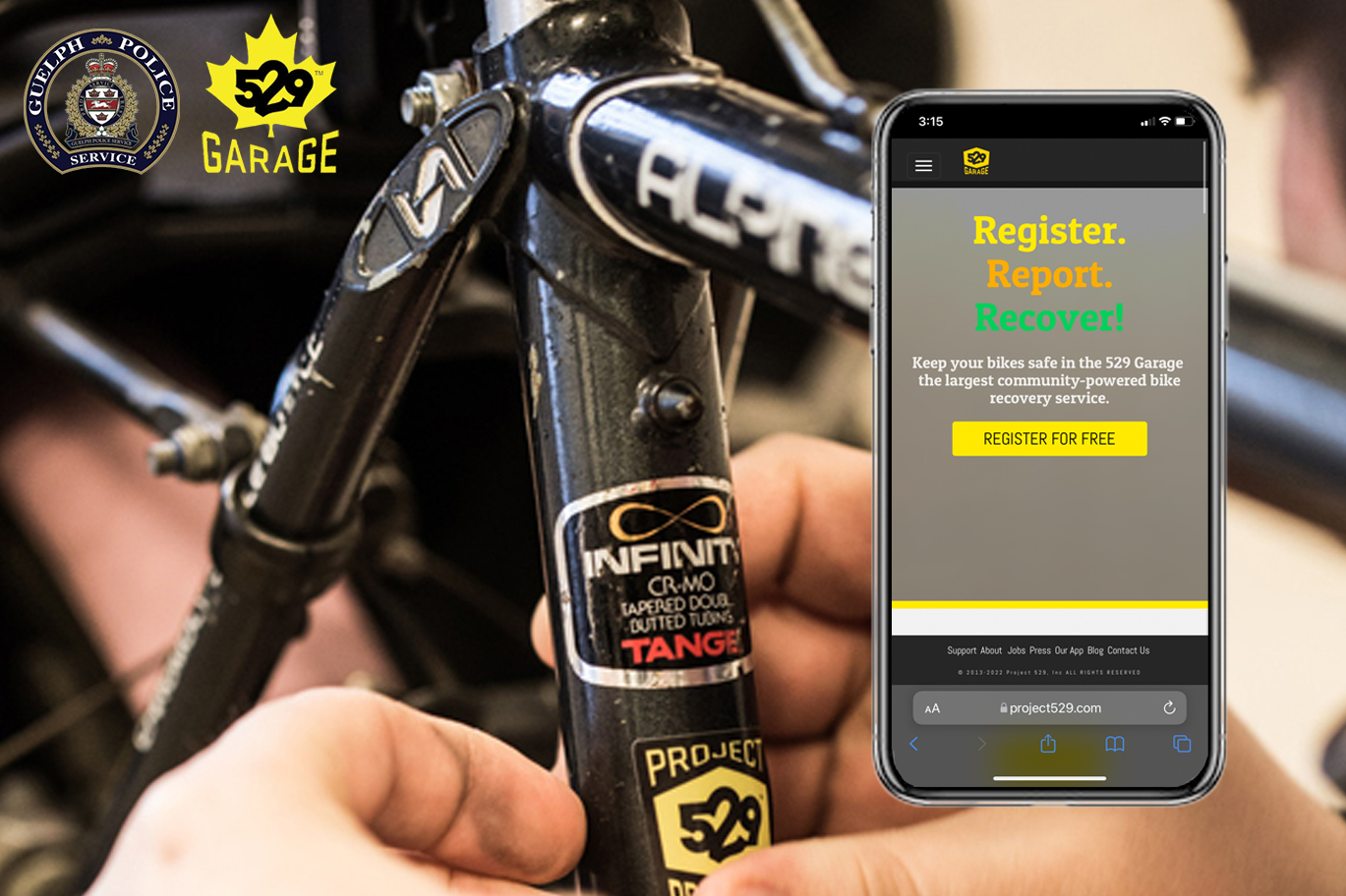 Man putting Garage 529 sticker on bike