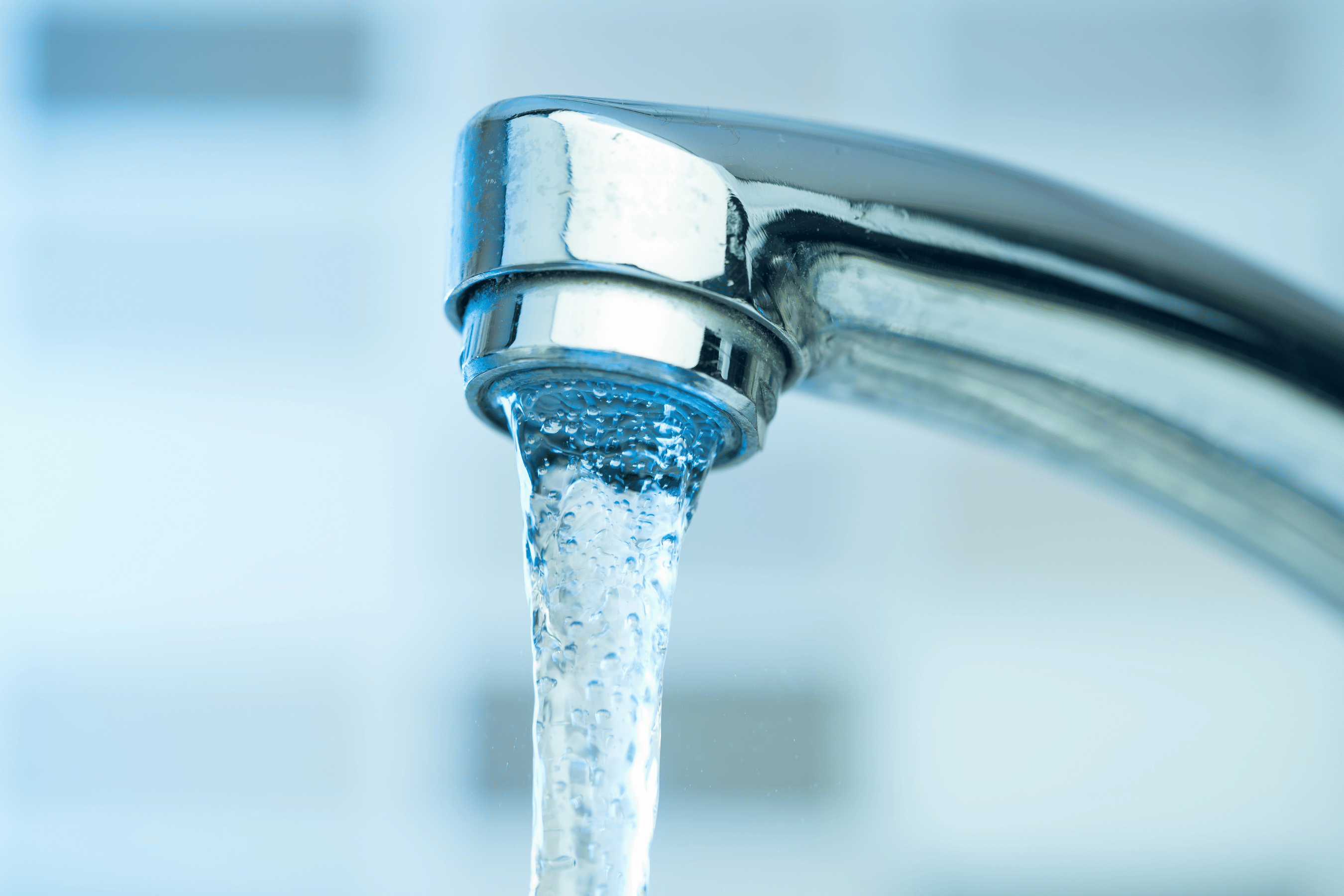 Water pours from a faucet