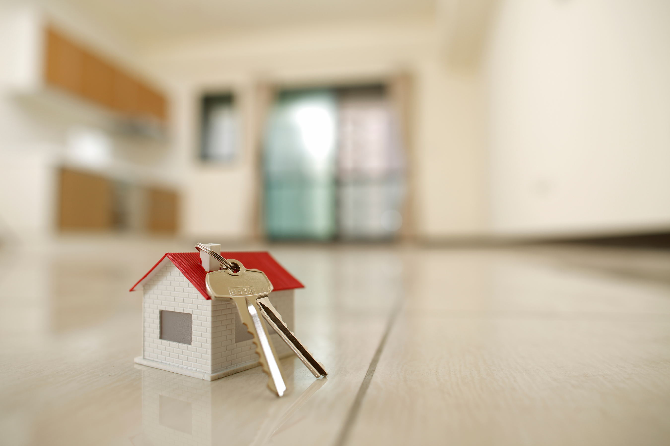 Model home with house keys