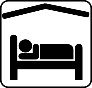 image of a bed under a roof