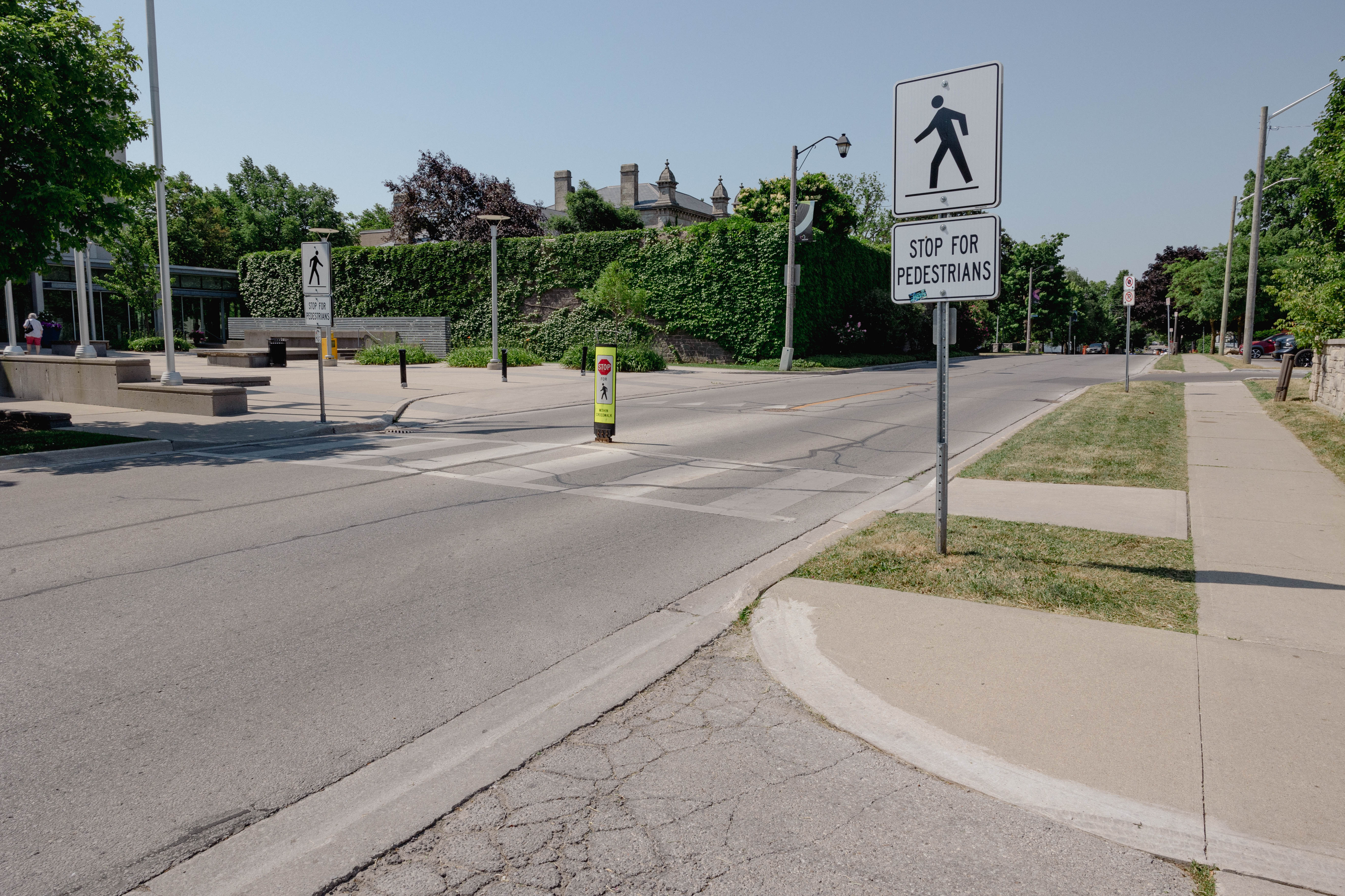 Pedestrian crossing with side-mounted flashing beacons.