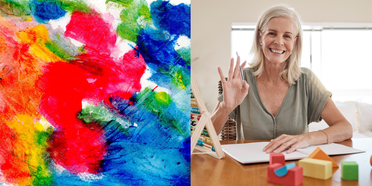 Wise woman sitting at table with notepad and wooden toys