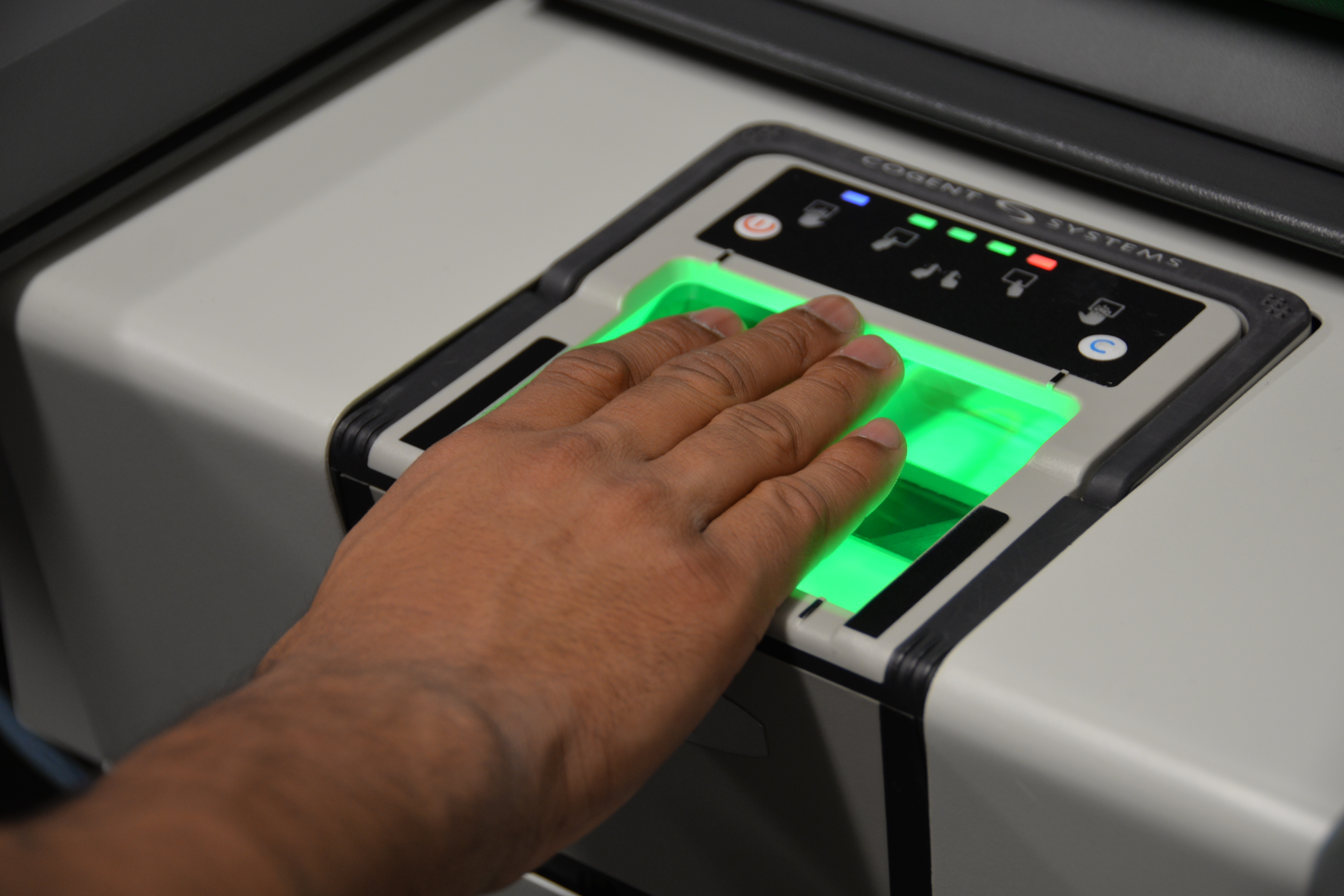 Hand on fingerprint scanner