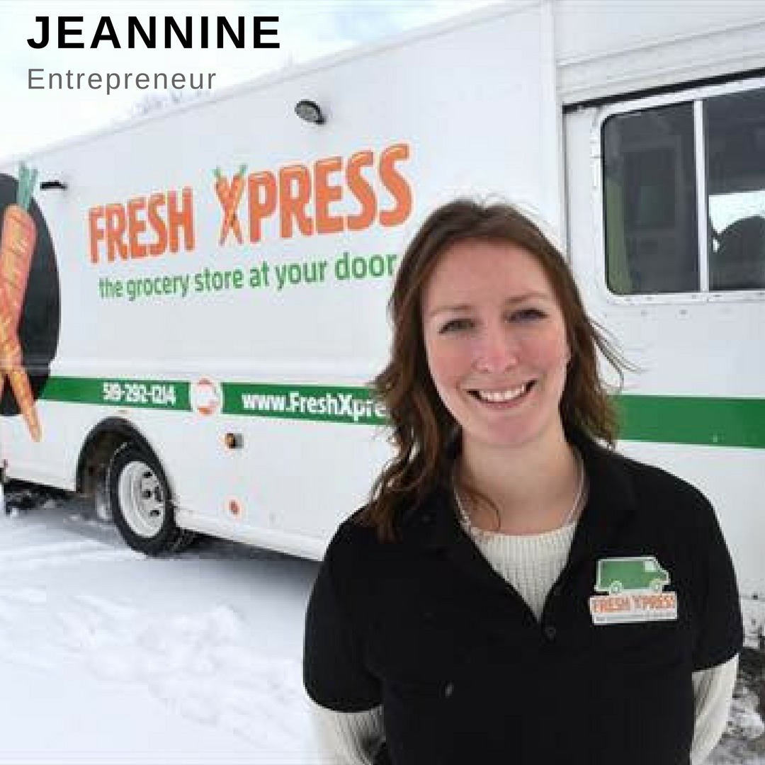 Young woman smiling in front of her food truck