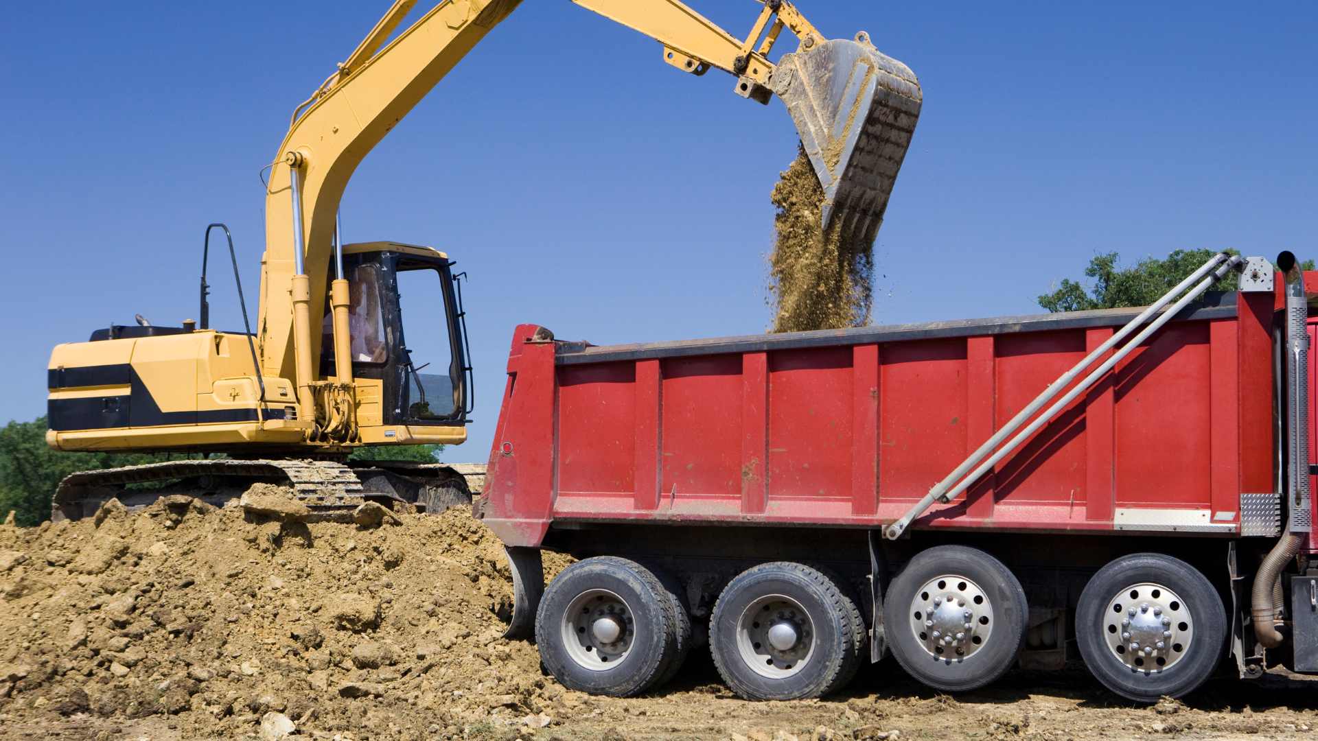 Dump truck moving dirt