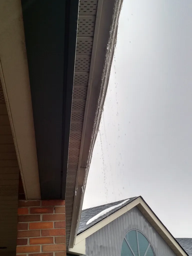 rain dripping from eaves trough