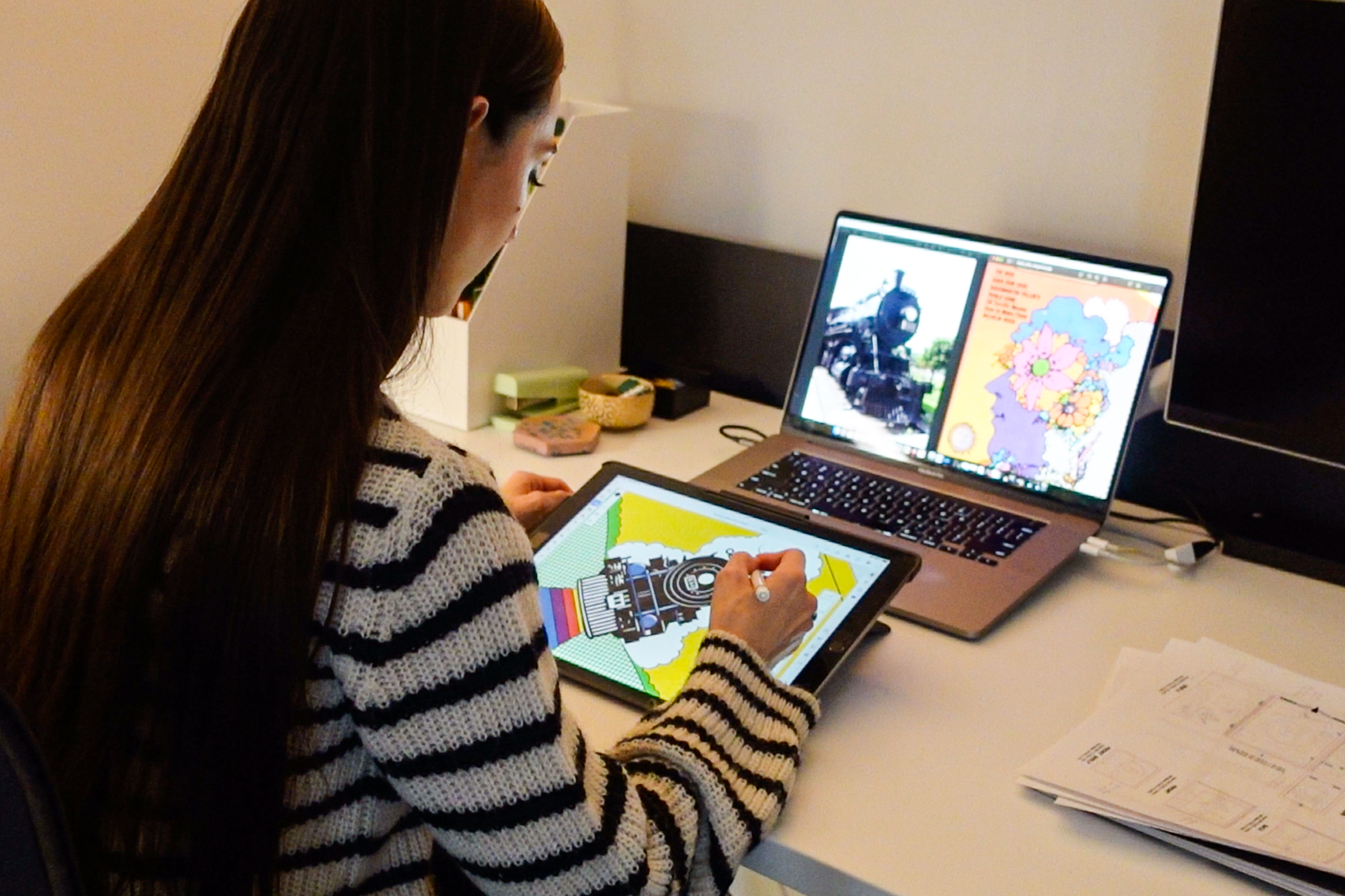 Artist Stephanie Scott is drawing an illustration on an ipad