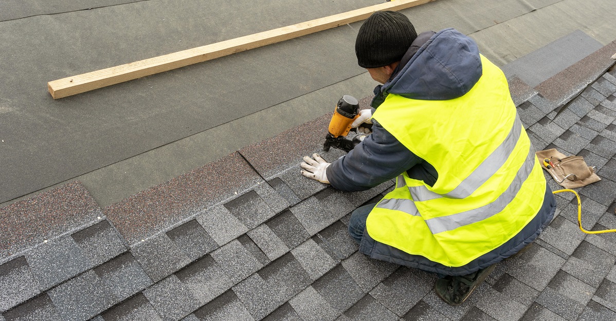 a roofer at work