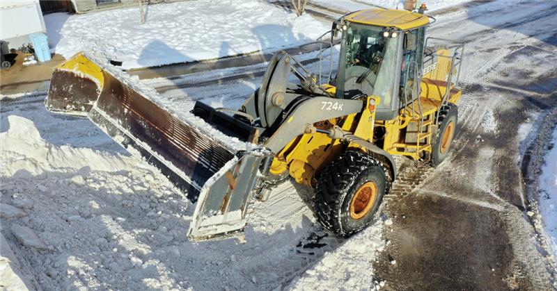 6-way loader piling snow