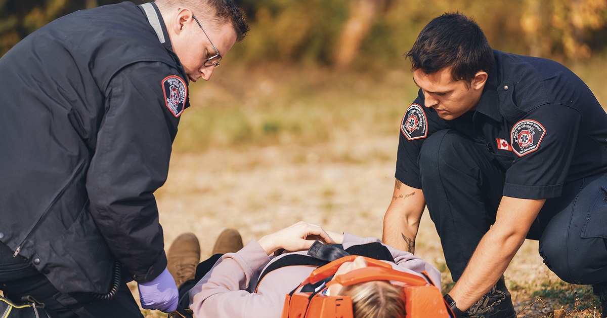 paramedics assist a patient