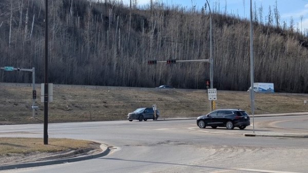Vehicles at the Highway 63 and Hardin St. intersection