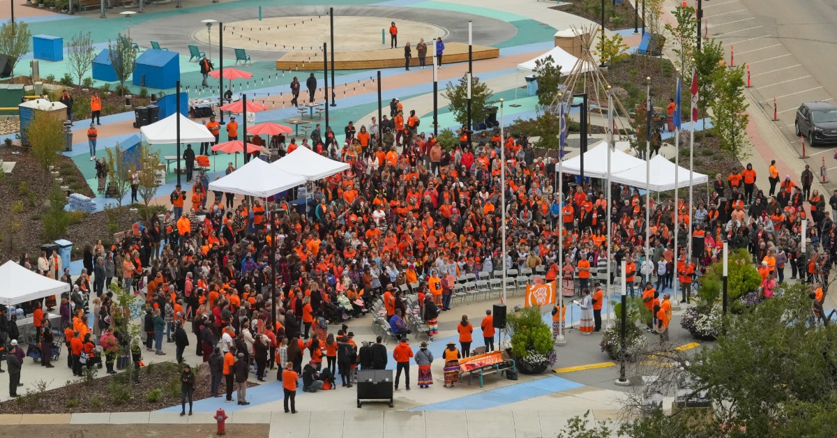 Aerial view of gathered participants for the 2023 Community Gathering and Walk for National Day for Truth and Reconciliation in kiyam Community Park in Fort McMurray, Alta.