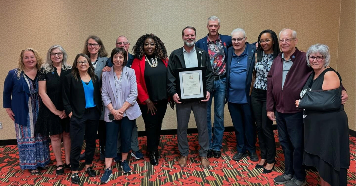 Members of Council and ACOA pose with the Age-Friendly Recognition Award
