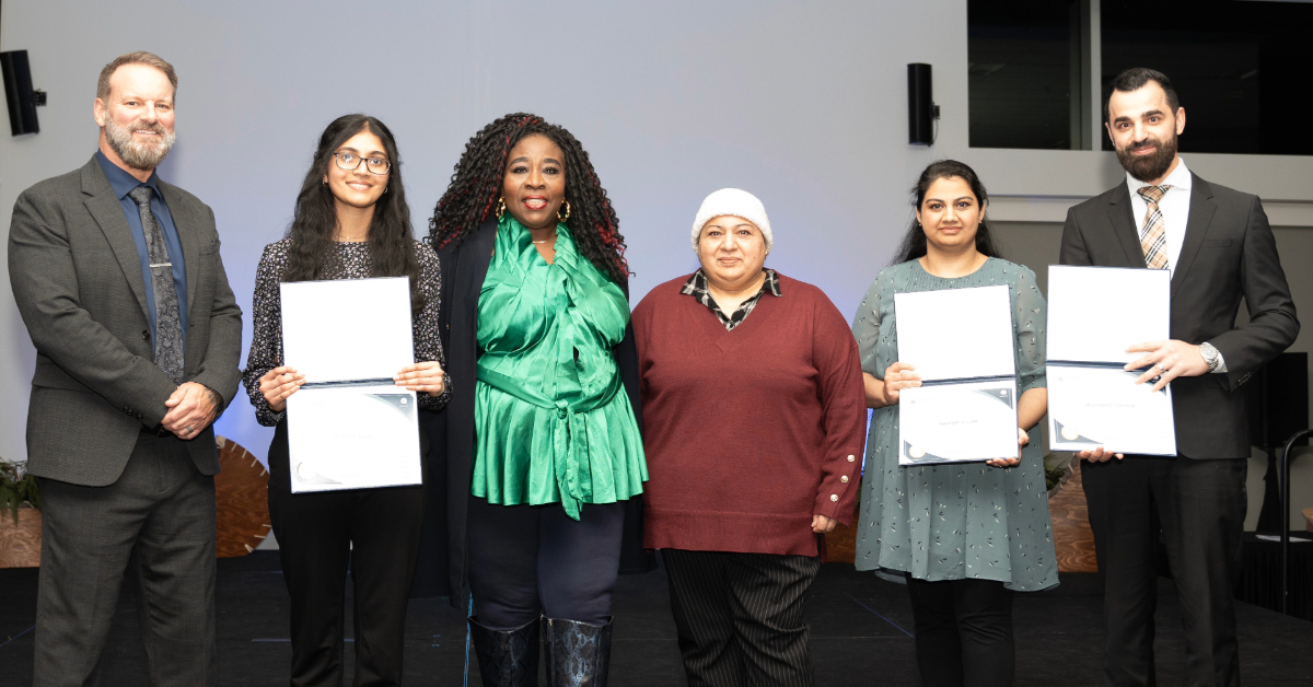 Council members and award winners smile for a photo at the 2024 Council's Excellence Awards held in Shell Place. From left to right: Mayor Sandy Bowman, Youth award winner Lalithya Raavi, Councillor Funke Banjoko, Everyday Hero Nadeem Aslam's sister Ferhana Muneeb and daughter Naba Nadeem, as well as Citizen of the Year Mohamed Tarrabin.