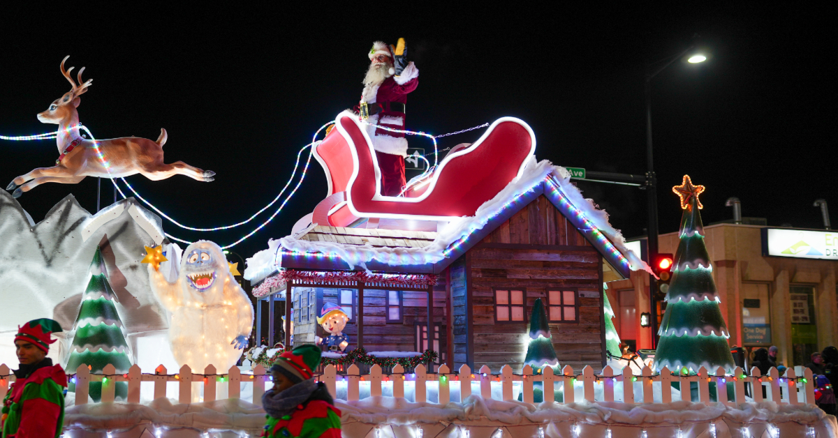 Santa Claus rides down Franklin Ave. during the 2023 Santa Claus Parade