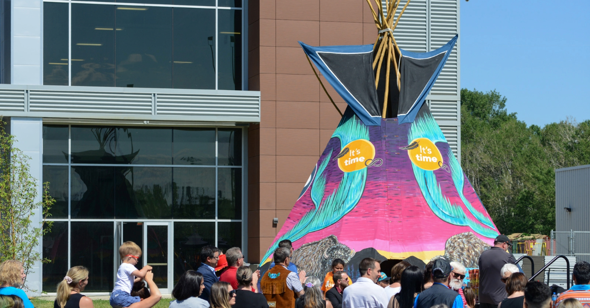 Crowds of people socialize and enjoy food and drink at the National Indigenous Peoples Day event at Shell Place in Fort McMurray, Alta. on June 21, 2022.