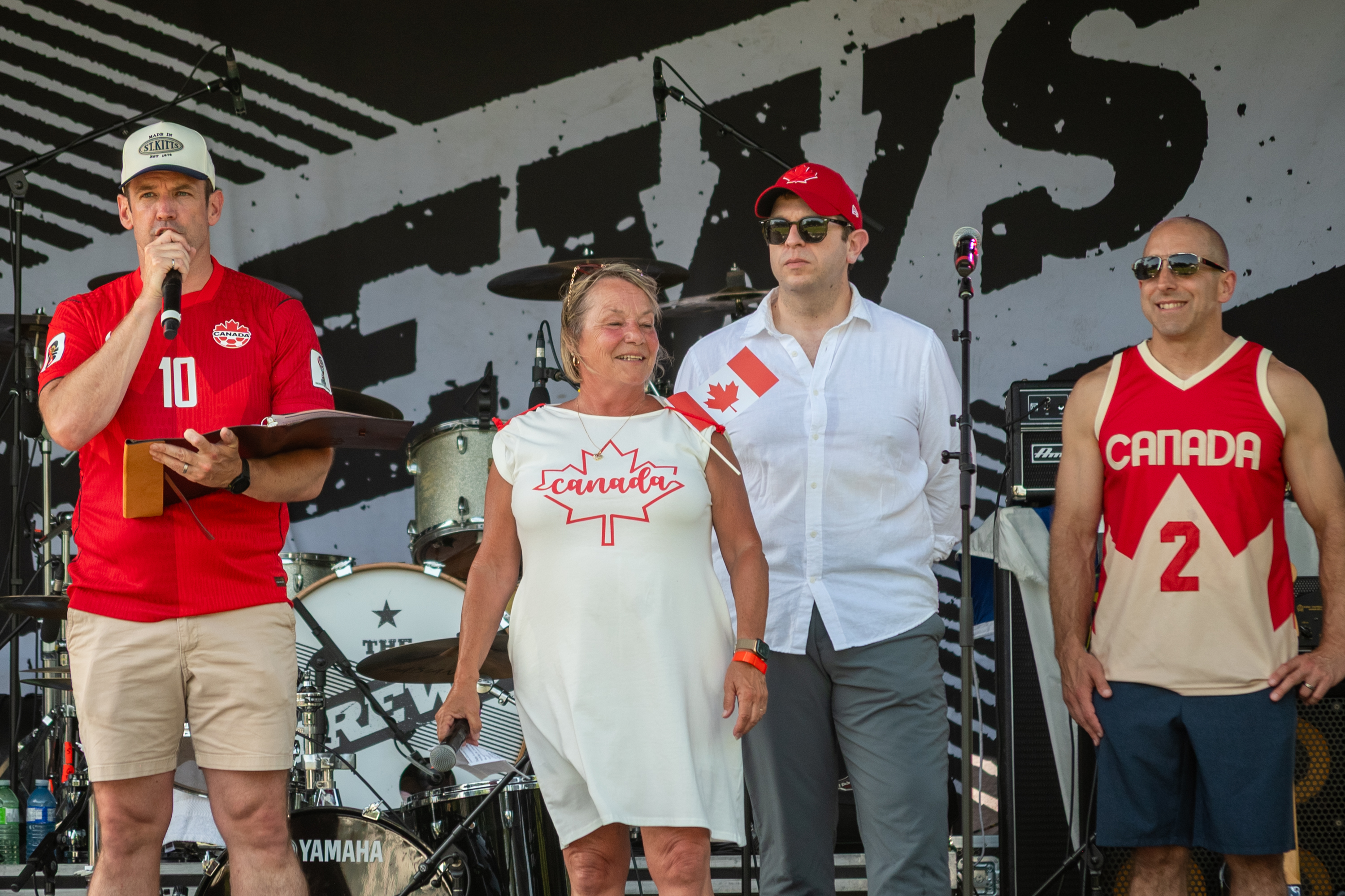 Mayor Mat Siscoe, MPP Jennie Stevens, MP Chris Bittle, and Councillor Marty Mako dressed in their red and white for Canada Day