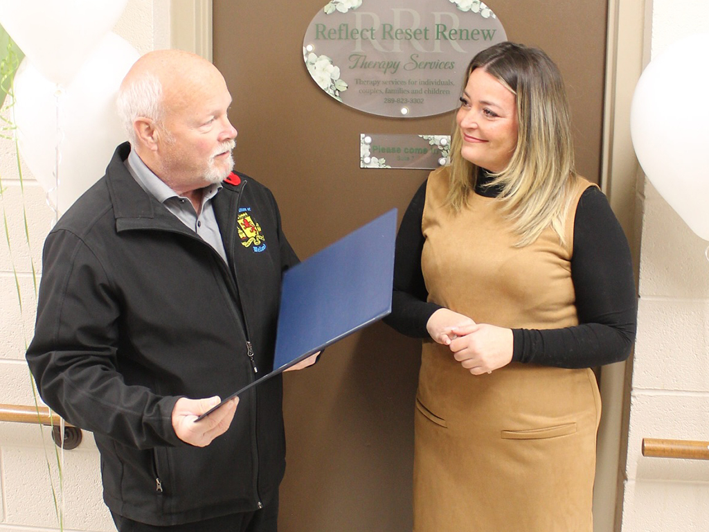 Mayor campion talking with a healthcare providor