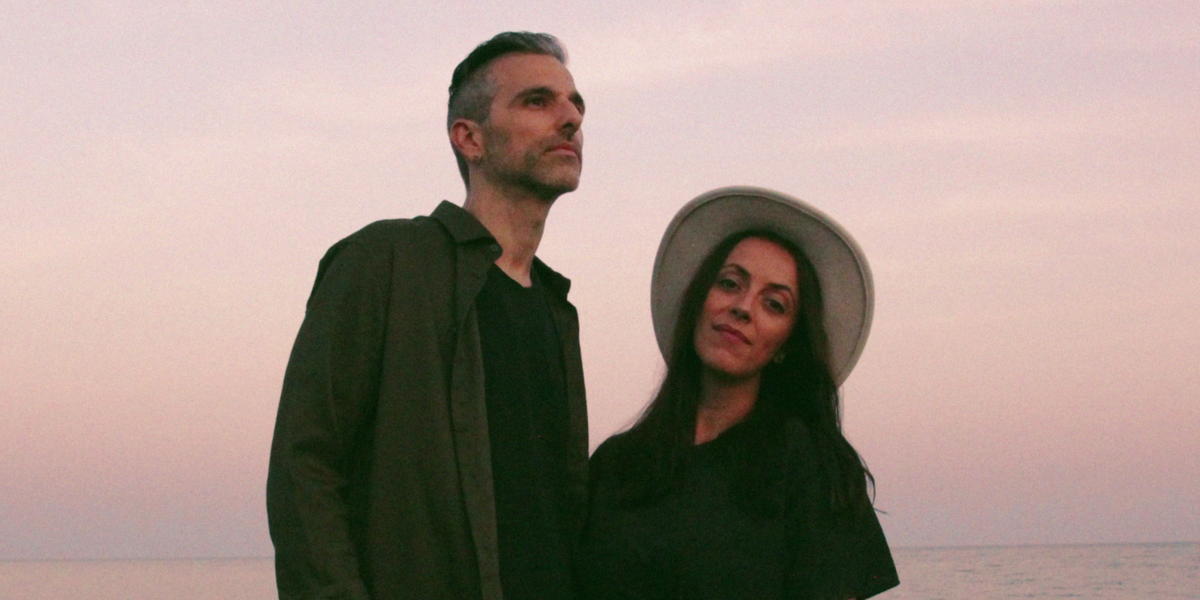 Candance and Michael in front of pink sky